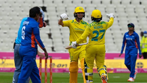 Ash Gardner and Alana King celebrate the winning runs at Edgbaston in Australia’s opening match. 
