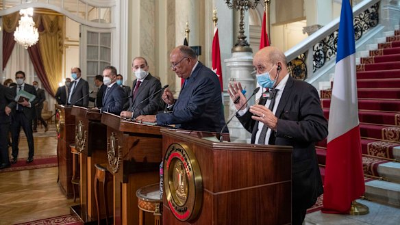 From right to left, foreign ministers for France, Jean-Yves Le Drian; Egypt, Sameh Shoukry; Jordan, Ayman Safadi, and Germany, Heiko Maas, at Tahrir Palace in Cairo on Monday.