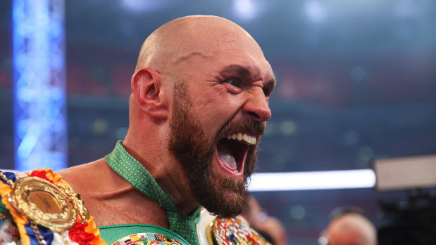 Tyson Fury celebrates his victory. 