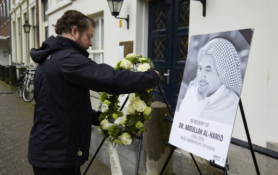 A human rights activist from Amnesty International lays a wreath outside the Saudi Arabia embassy to commemorate Dr Abdullah al-Hamid, a prisoner of conscience who passed away while in detention in Saudi Arabia.