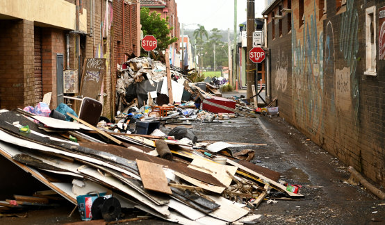 Debris from the previous floods was blocking a lane in Lismore’s city centre as the town braced for further flooding.