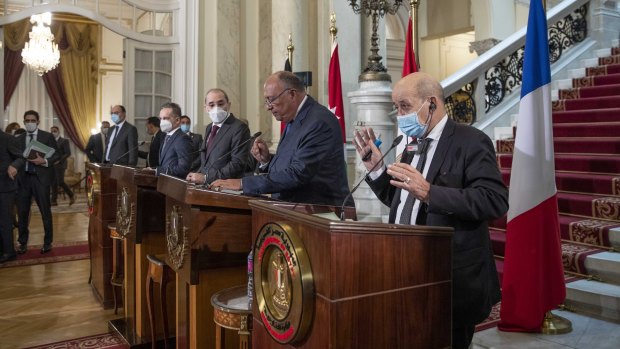 From right to left, foreign ministers for France, Jean-Yves Le Drian; Egypt, Sameh Shoukry; Jordan, Ayman Safadi, and Germany, Heiko Maas, at Tahrir Palace in Cairo on Monday.