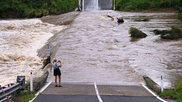 The Coomera River cuts off Clagiraba Road on the Gold Coast.