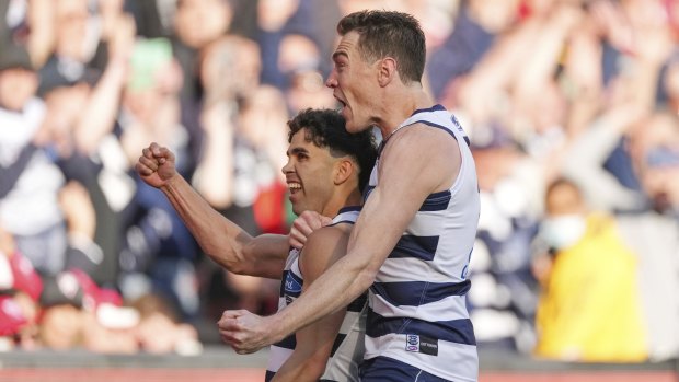 Tyson Stengle celebrates a goal with Jeremy Cameron.