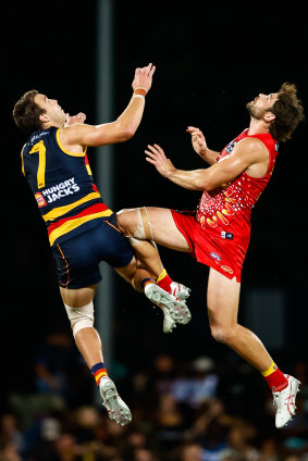 Adelaide’s Riley Thilthorpe and Levi Casboult compete in the ruck.