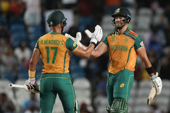 South African batsmen Reeza Hendricks, left, and Aiden Markram guide their team home against Afghanistan.