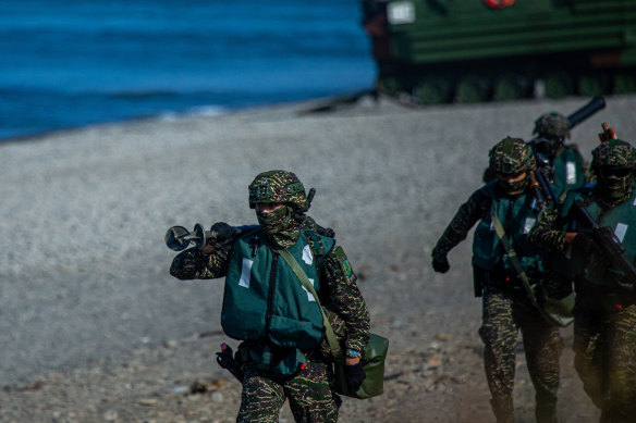 Be prepared: Taiwanese soldiers take part in military exercises last week that simulated a Chinese invasion.