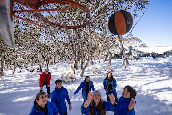 Alpine School principal Russell Shem shoots hoops with students Dylan Pilkington, 14, Terence Ioannou 14, Gloria Hong Nhien Bui 14, Samara Wahab Rahman 14, Edie Clutterbuck, 14. and Ryan Braid, 14.
