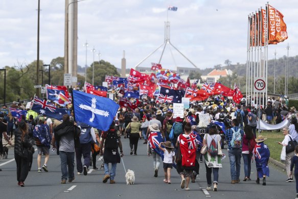 Protesters from the Convoy to Canberra march towards the Parliamentary Triangle.