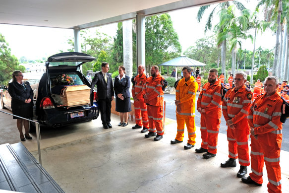 Hundreds of “orange angels” - SES officers in official uniforms - formed a guard of honour for Ms Dray’s funeral.