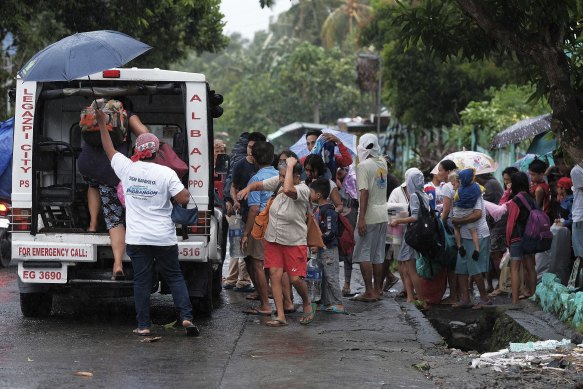 Residents evacuate ahead of Typhoon Kammuri in Legazpi, Albay, Philippines.