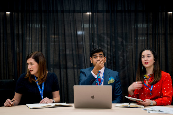 Celia Pacquola, Dilruk Jayasinha and Nina Oyama in Utopia, which mines the absurdity of bureaucracy.