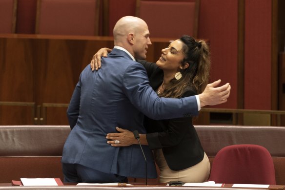 ACT senator David Pocock, left, embraces Victorian senator Lidia Thorpe as she spent her first day in the Senate as an independent.