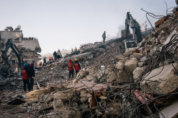 Rescue teams search through the rubble in Kahramanmaras, Turkey.