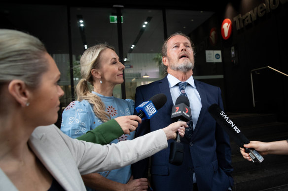 Craig McLachlan with his partner, Vanessa Scammell, after his not guilty verdict was announced.