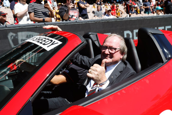 Bombers legend Kevin Sheedy parades around pregame.