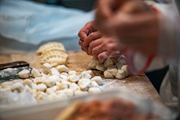 Handmade dumplings under construction.