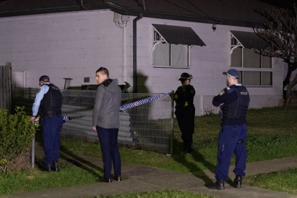 Police set up a crime scene at the home of Mert Ney in Marayong.