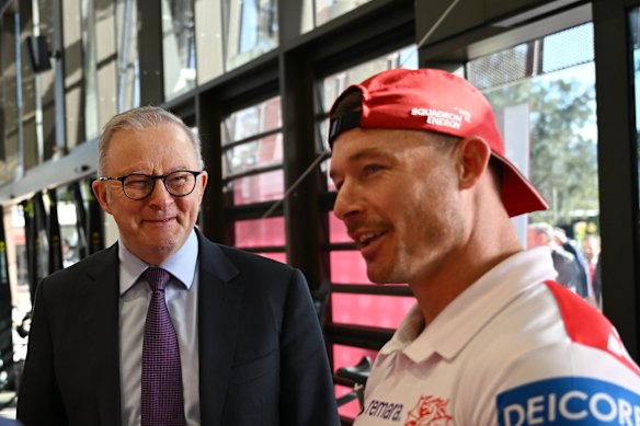 Anthony Albanese chats with St George Illawarra hooker Damien Cook at the opening of the Dragons’ new centre of excellence in North Wollongong on Friday.