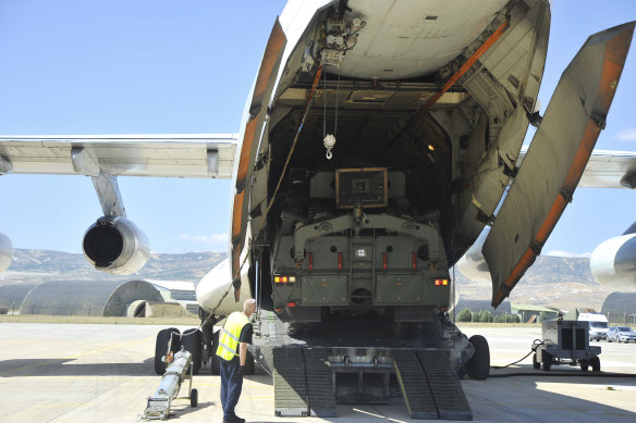 Parts of the S-400 air defence system are unloaded from a Russian plane at Murted military airport near Ankara, Turkey. 