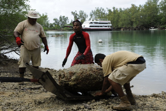 A thousand-pound US bomb pulled out of a lagoon on the southern tip of Peleliu, part of the Republic of Palau. This bomb was one of 40 found in the lagoon, a popular diving site with tourists. 
