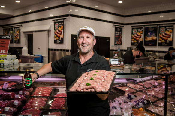 The Butcher Club director Peter Robinson with a tray of VB snags.