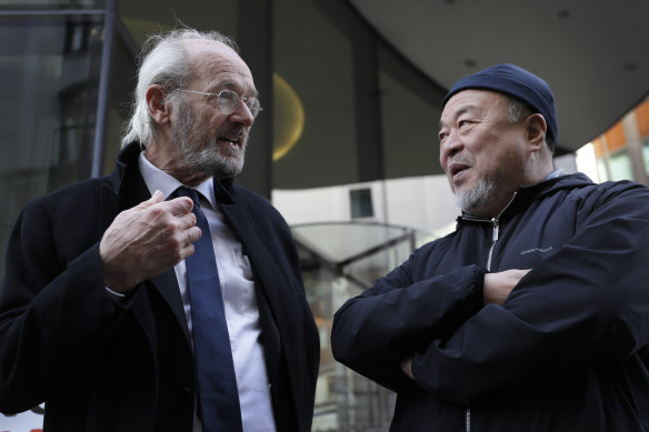 Julian Assange's father John Shipton with Chinese contemporary artist and activist Ai Weiwei, outside the Old Bailey in London.