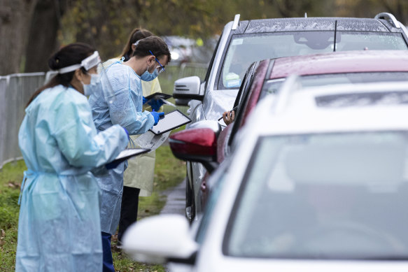 Medical staff at a pop-up testing site at Albert Park Lake. 