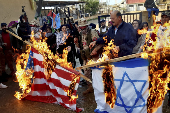 Burning of US, Israeli and British flags has occurred regularly throughout Middle East protests, like this one in Lebanon, since the US assassination of Iranian General Qassem Soleimani.
