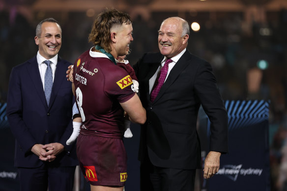 Lewis, pictured at right celebrating Queensland’s 2023 Origin win, has revealed he is battling dementia.