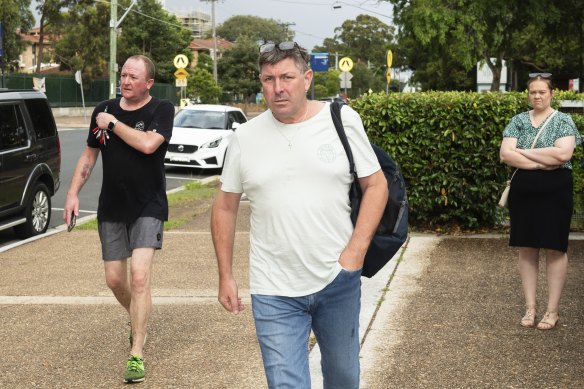 Scott Andrew Minigle  (centre) outside the Sutherland Local Court moments before he lashed out at journalists and then proceeded to answer their questions.