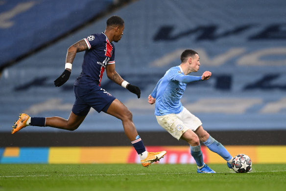 Phil Foden unleashes a shot at Etihad Stadium.