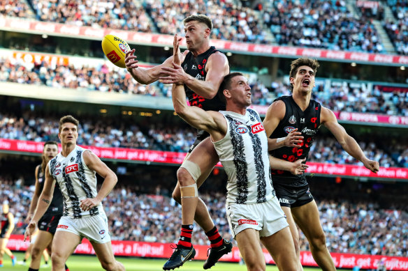 Essendon and Collingwood clash on Anzac Day 2022.