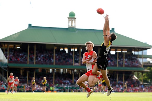 Richmond’s Tyler Sonsie takes a high mark.
