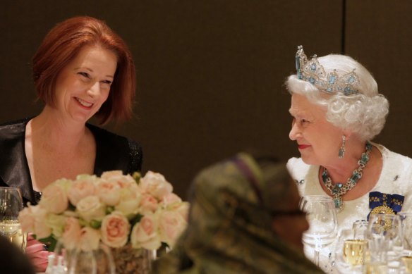 Queen Elizabeth II with then-prime minister Julia Gillard at the  Commonwealth Heads of Government Meeting banquet in Perth on October 28, 2011.