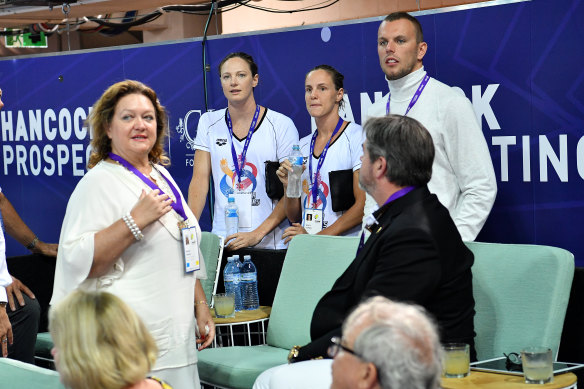 Gina Rinehart is seen talking to swimmers Cate Campbell (second from left), Bronte Campbell and Kyle Chalmers during the 2018 Australian swimming trials.