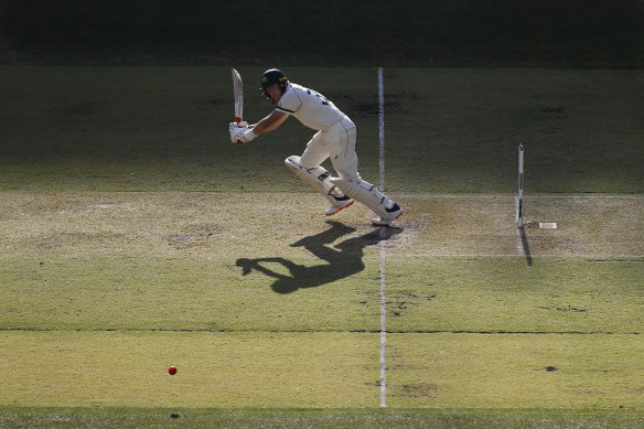 Too good: Marnus Labuschagne clips one through the leg side as shadows stretch across the Optus Stadium surface.