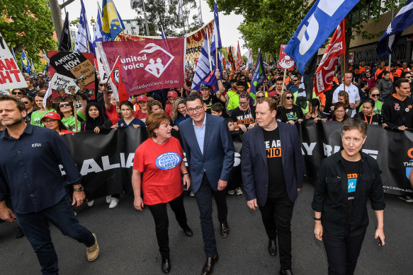 Daniel Andrews with ETU leader Troy Grey (left) and other union movement leaders at a rally in Melbourne in 2018.