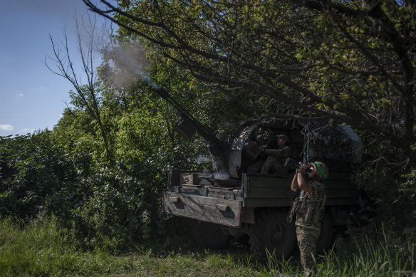 Ukrainian soldiers fire at the Russian air target on the frontline near Bakhmut, in the Donetsk region on  Monday.