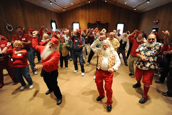 Santa Students practice dancing at the Charles W. Howard Santa Claus School workshop in Michigan.