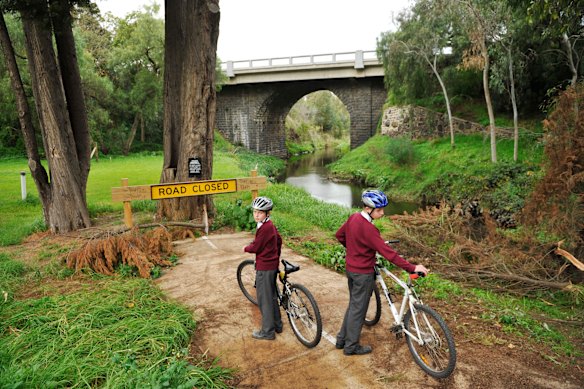 Daniel (left) and James Jones in 2008 at what was once the abrupt end to the Darebin Creek bike bath in Alphington.