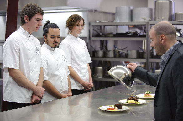 Back in 2010, Matthew Caldicott, Adam Liaw and Claire Winton Burn brace themselves in MasterChef.