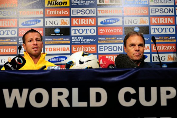 A lifetime ago: Lucas Neill and Holger Osieck in 2013.