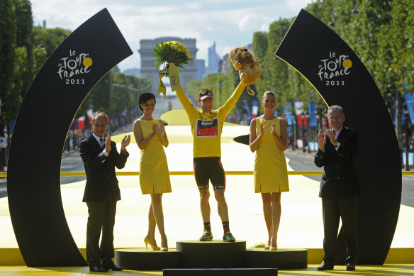 Cadel Evans celebrates his triumph at the Tour de France in 2011. 
