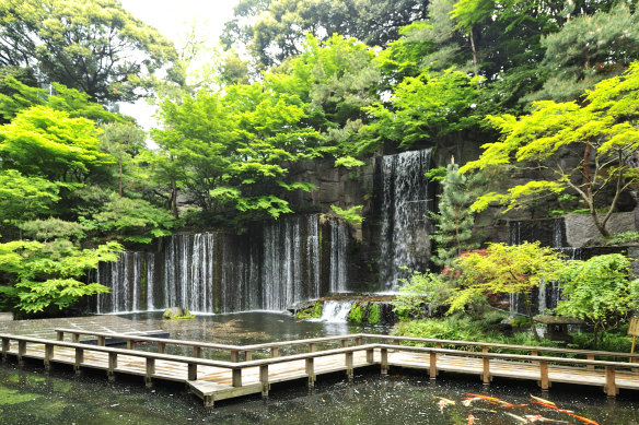 The waterfall and gardens create a sense of santuary from Tokyo’s bustle.