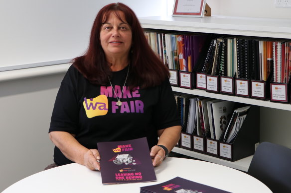 WACOSS chief executive Louise Giolitto with a copy of the new report.