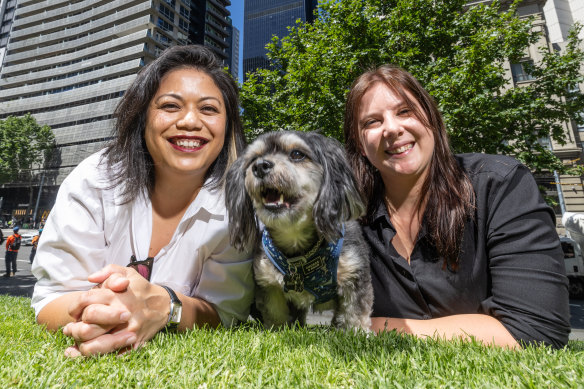 All in the family: Former partners Klyde Salcedo (left) and Emma Kennedy, with Snickers.