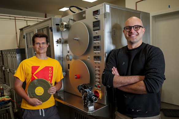 Jordan Dautovic, right, with colleague Lance Weeks, is about to bring film processing for movies back to Australia. 