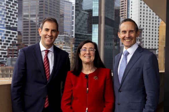 Treasurer Jim Chalmers, ACCC chair Gina Cass-Gottlieb and assistant minister Andrew Leigh on Wednesday. The Treasurer said the proposed reforms would strengthen the economy and lift living standards.