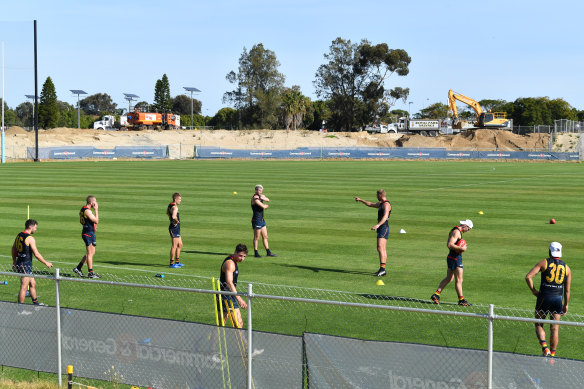 Adelaide players returned to group training on Monday after breaking training protocols in recent weeks.